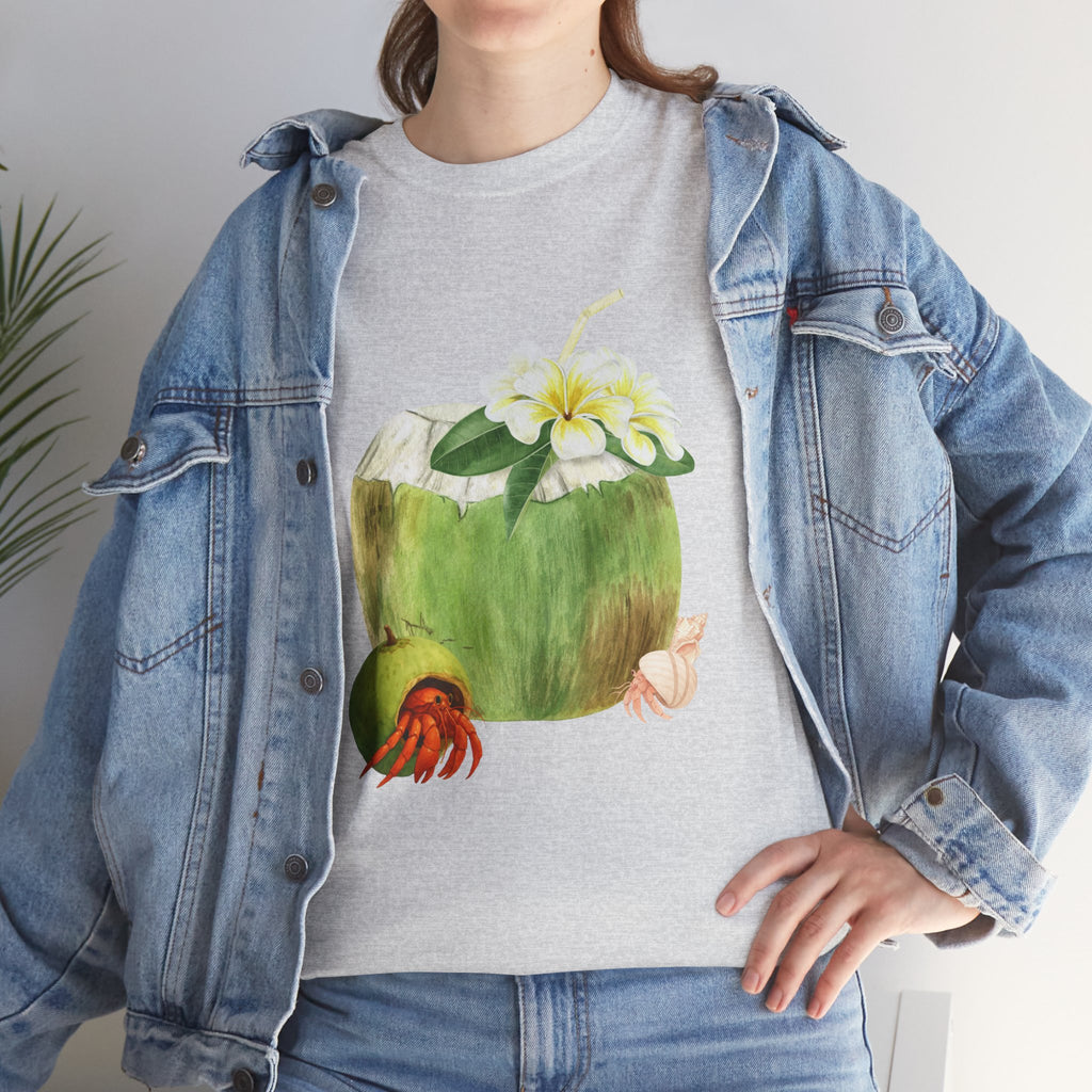 A girl wearing a denim jacket over a grey t-shirt featuring a colorful design of a hermit crab in a coconut shell and a straw-topped coconut.