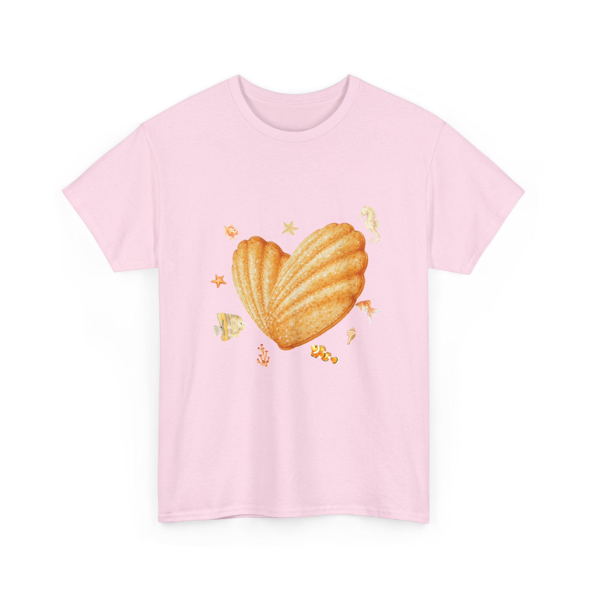 Pink t-shirt with a heart-shaped madeleine surrounded by yellow tropical fish, starfish, seahorses, and coral.