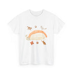 White t-shirt with a piece of nigiri sushi surrounded by a circle of cats, yarn balls, and cushions.