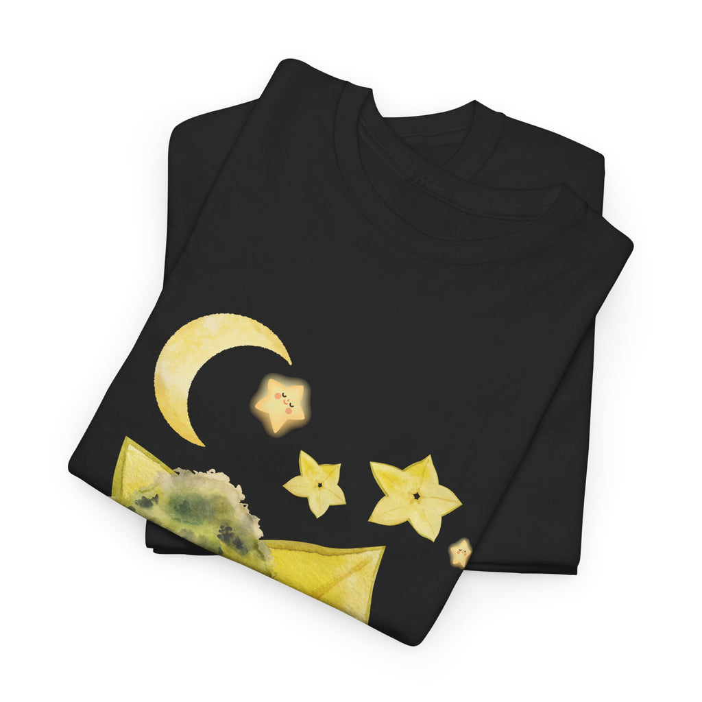 A folded black t-shirt featuring a graphic design of a tree stump, leaves, and starfruit celestial elements.