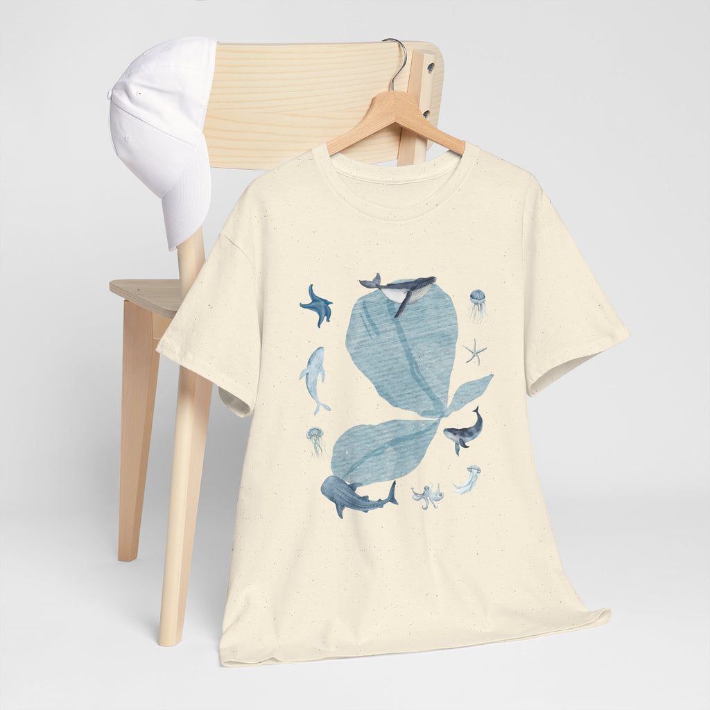 A beige t-shirt hanging on a chair, featuring a graphic design of a pink bloom surrounded by bunnies in various poses.