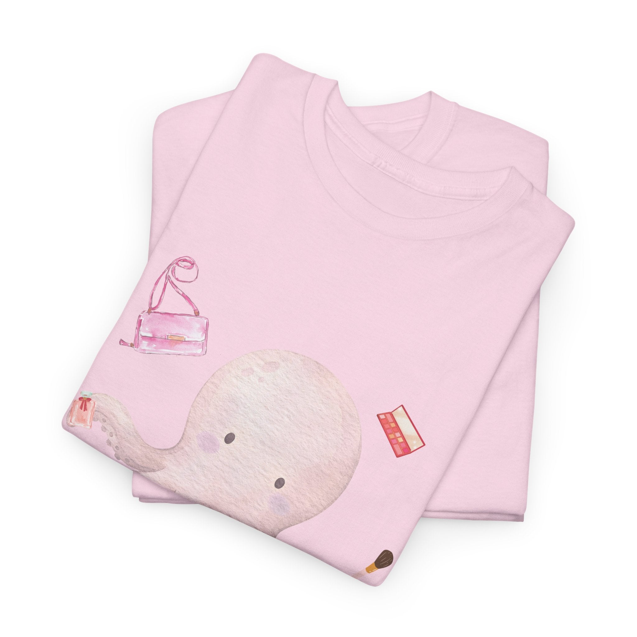 A folded pink t-shirt featuring a graphic design of a pink octopus multitasking its tentacles to apply lipstick, brush on makeup, and juggle beauty accessories.