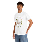 A man wearing a white t-shirt featuring a graphic design of a sea lion surrounded by green onions, cabbage, and broccoli.