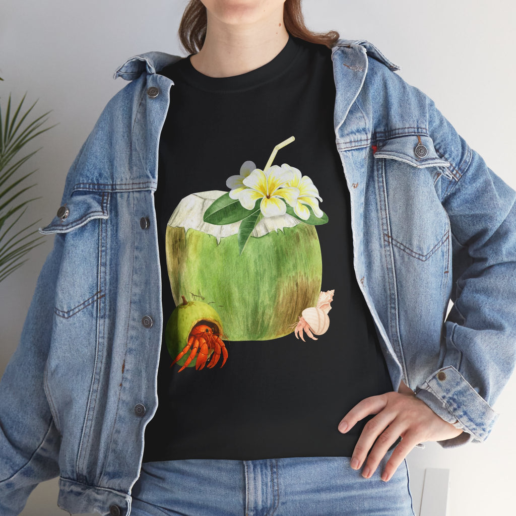 A girl wearing a denim jacket over a black t-shirt featuring a colorful design of a hermit crab in a coconut shell and a straw-topped coconut.