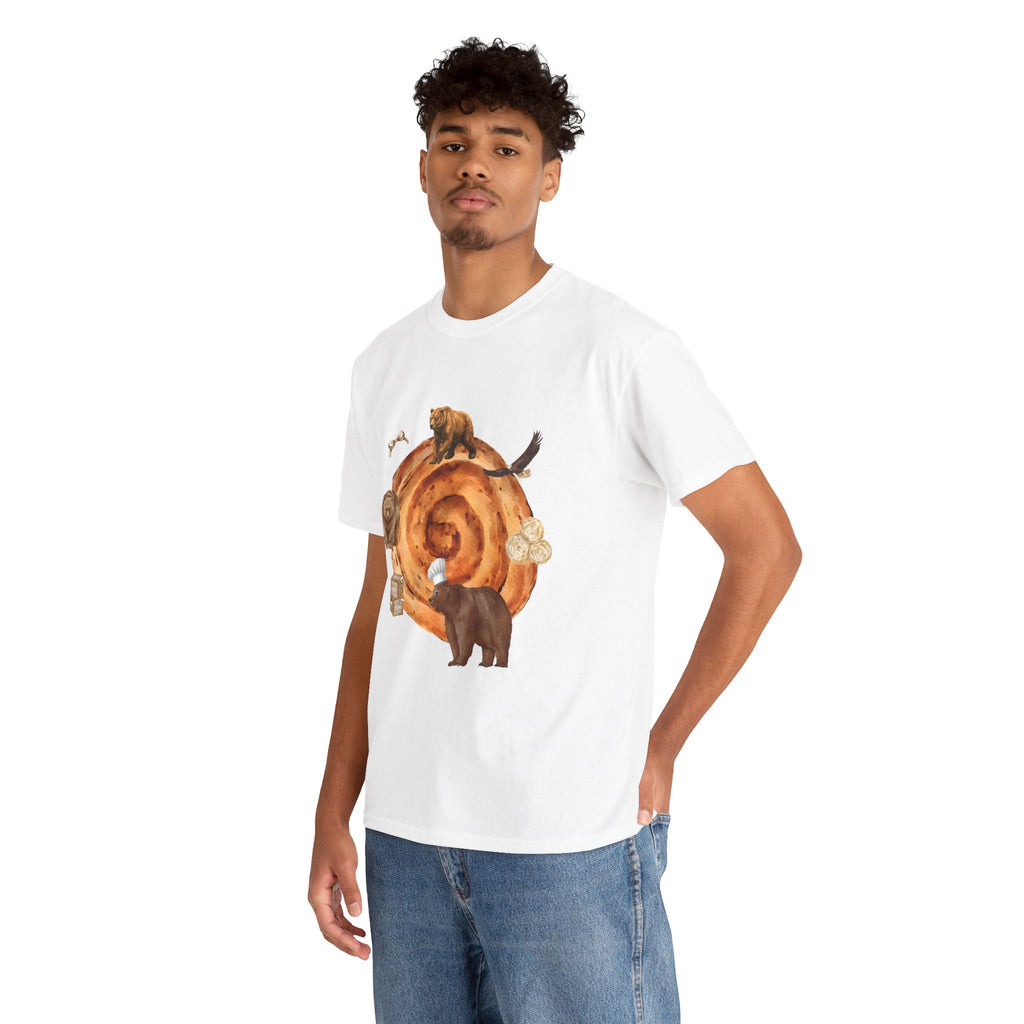 A man wearing a white t-shirt featuring a graphic design of a cinnamon roll surrounded by several hungry bears.