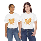 Two girls wearing white t-shirts featuring a graphic design of a heart-shaped madeleine surrounded by yellow tropical fish, starfish, seahorses, and coral.