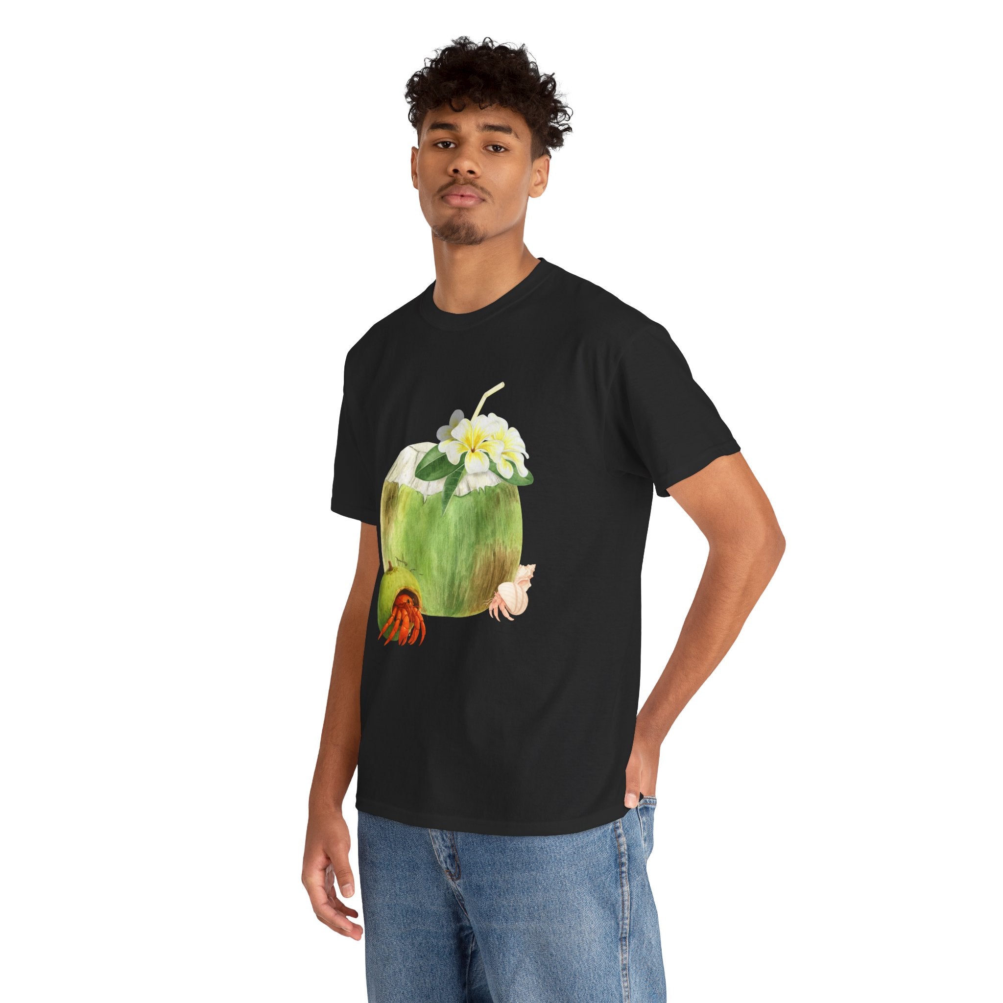 A man wearing a black t-shirt featuring a graphic design of a hermit crab in a coconut shell and a straw-topped coconut.