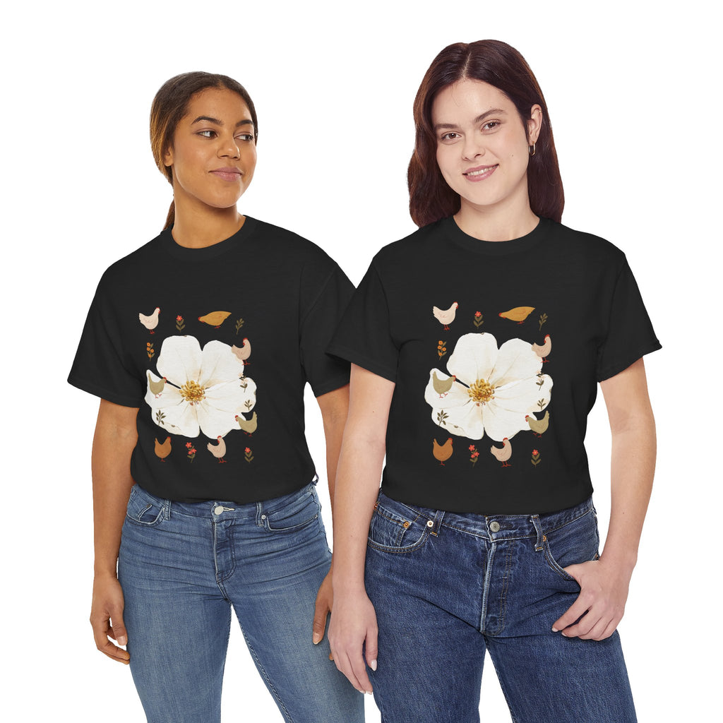 Two girls wearing black t-shirts featuring a graphic design of a bloom surrounded by roosters in various poses.