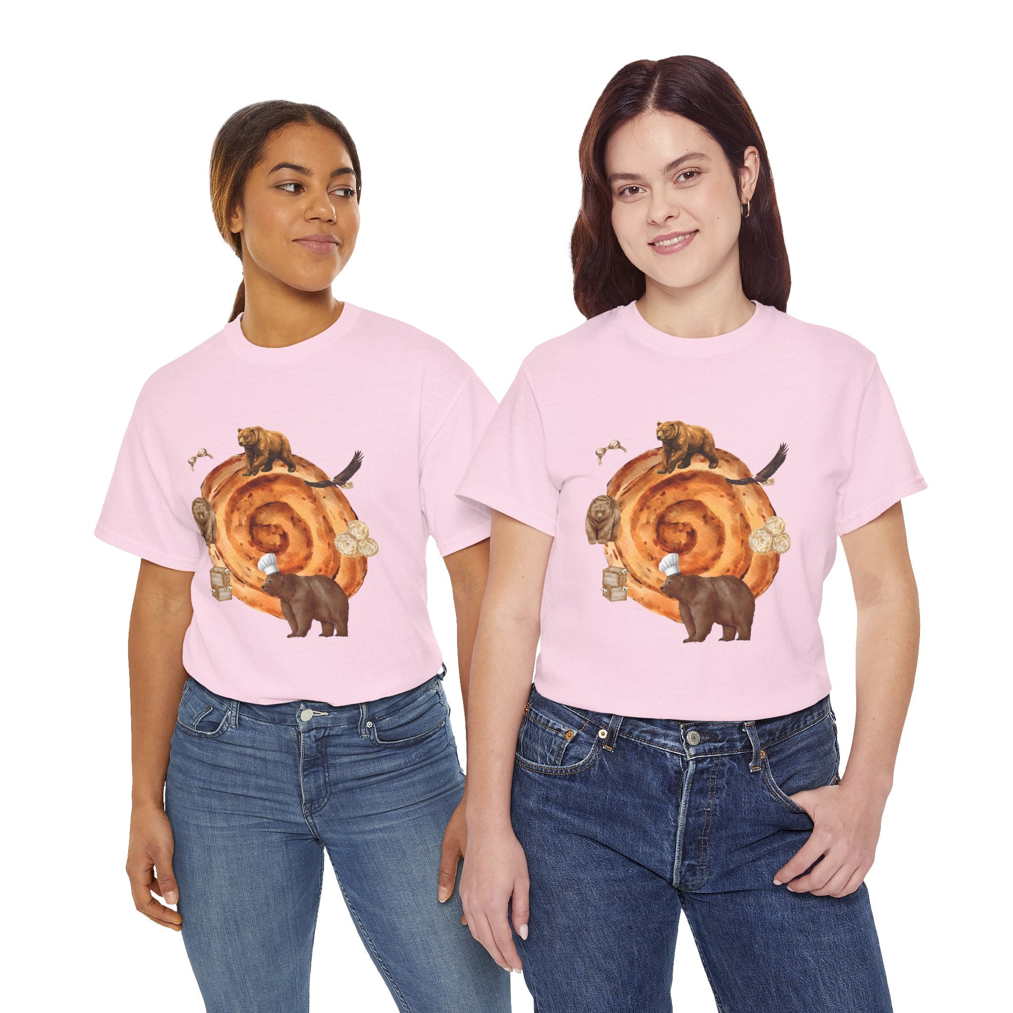 Two girls wearing pink t-shirts featuring a graphic design of a cinnamon roll surrounded by several hungry bears.