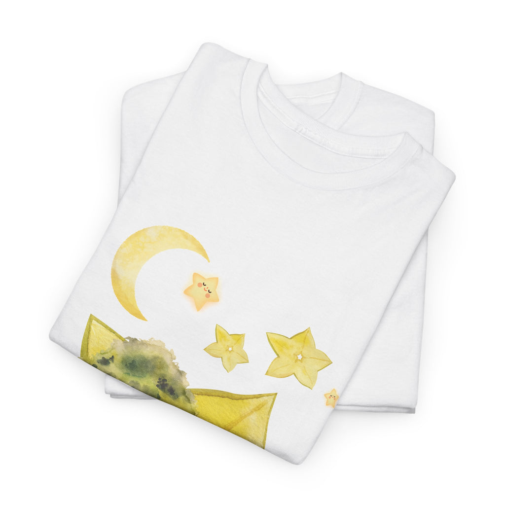A folded white t-shirt featuring a graphic design of a tree stump, leaves, and starfruit celestial elements.
