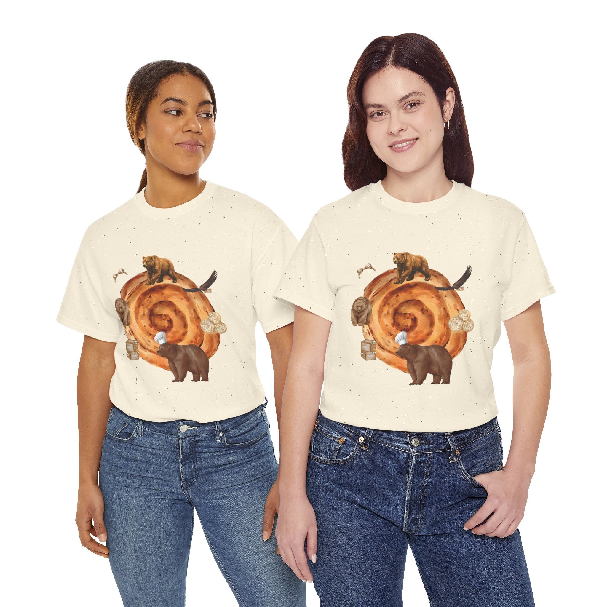 Two girls wearing beige t-shirts featuring a graphic design of a cinnamon roll surrounded by several hungry bears.