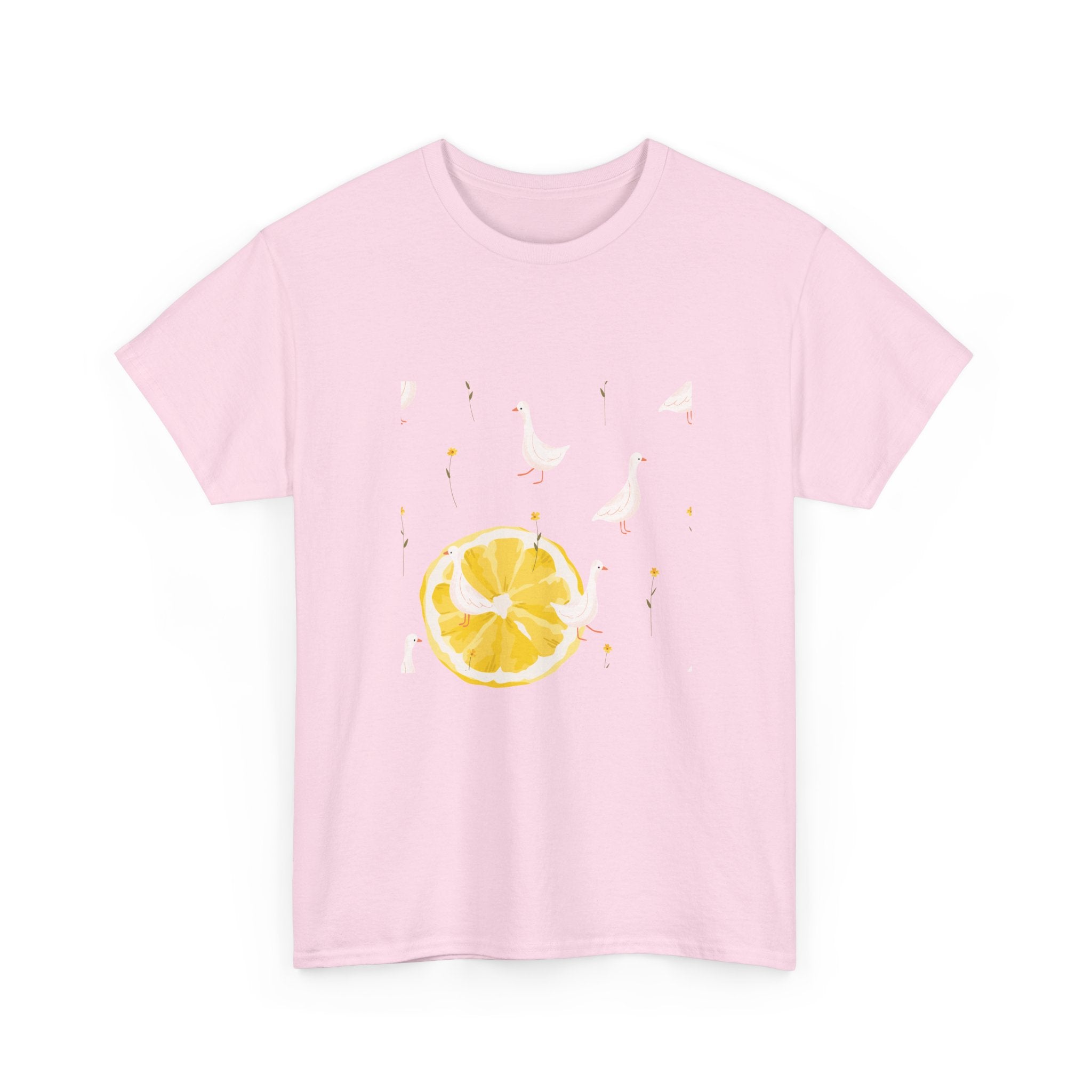 Pink t-shirt with a juicy lemon in the bottom-left corner and white ducks covering the entire design.