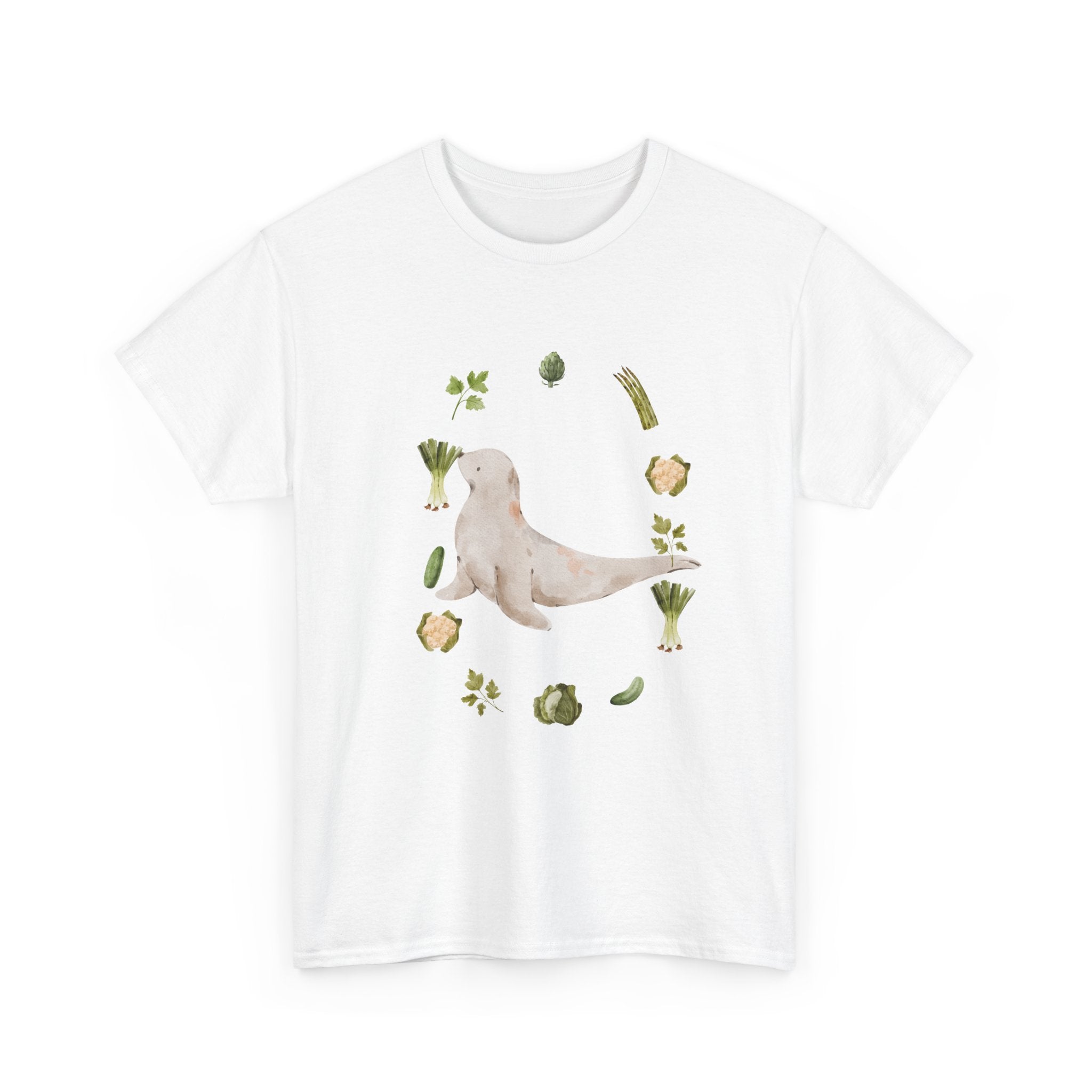 White t-shirt with a sea lion surrounded by green onions, cabbage, and broccoli.