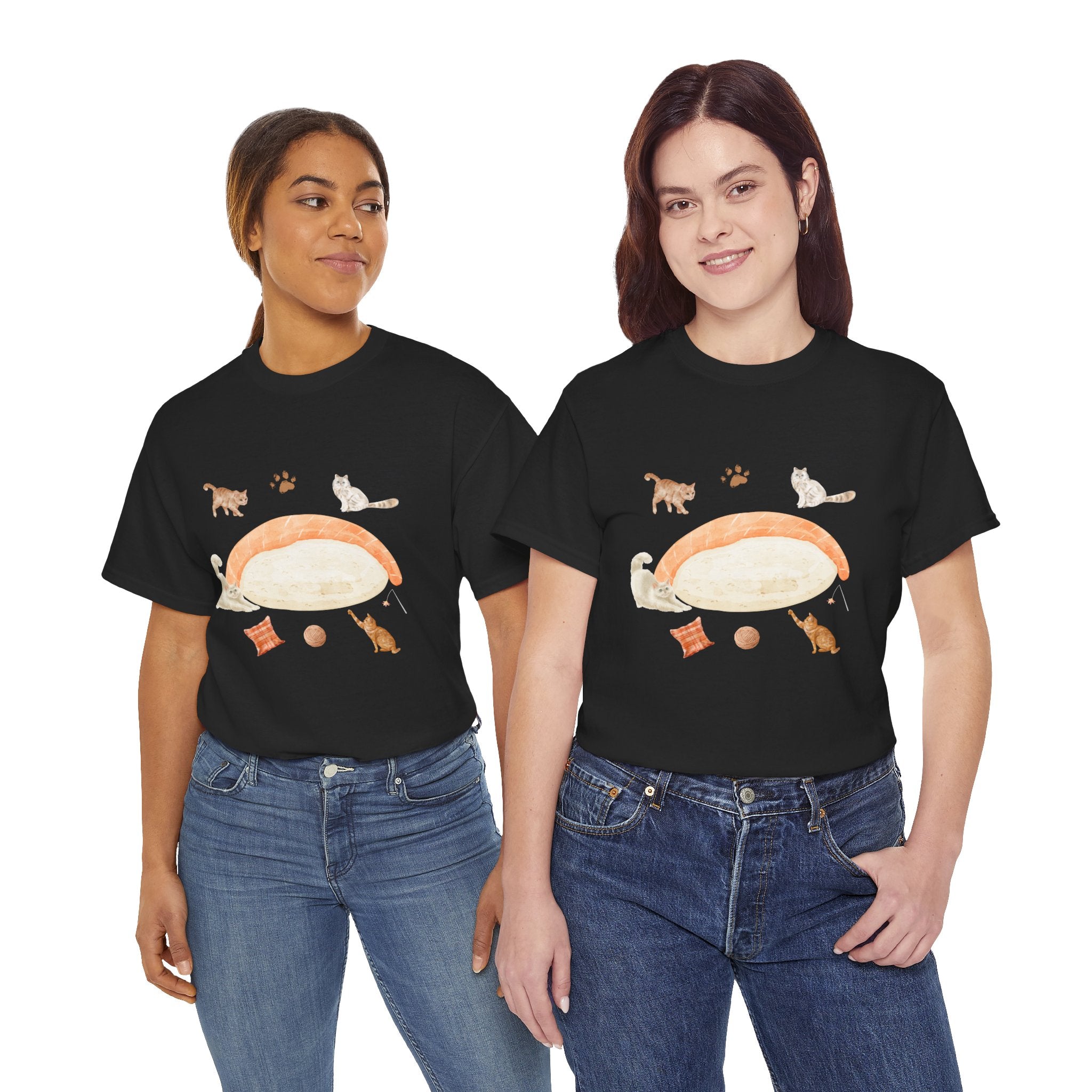 Two girls wearing black t-shirts featuring a graphic design of a piece of nigiri sushi surrounded by a circle of cats, yarn balls, and cushions.