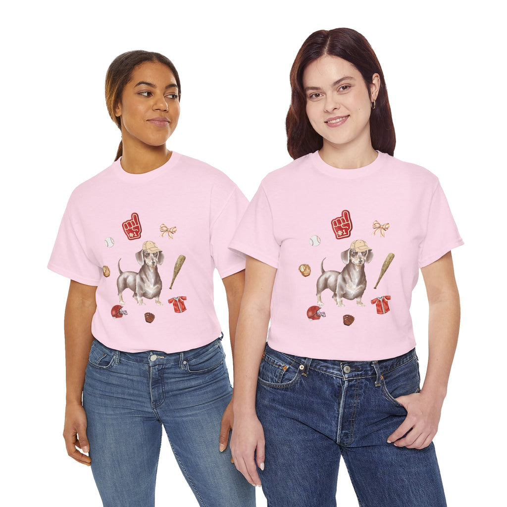 Two girls wearing pink t-shirts featuring a graphic design of a dog in a baseball hat surrounded by a circle of balls, bats, and helmets.