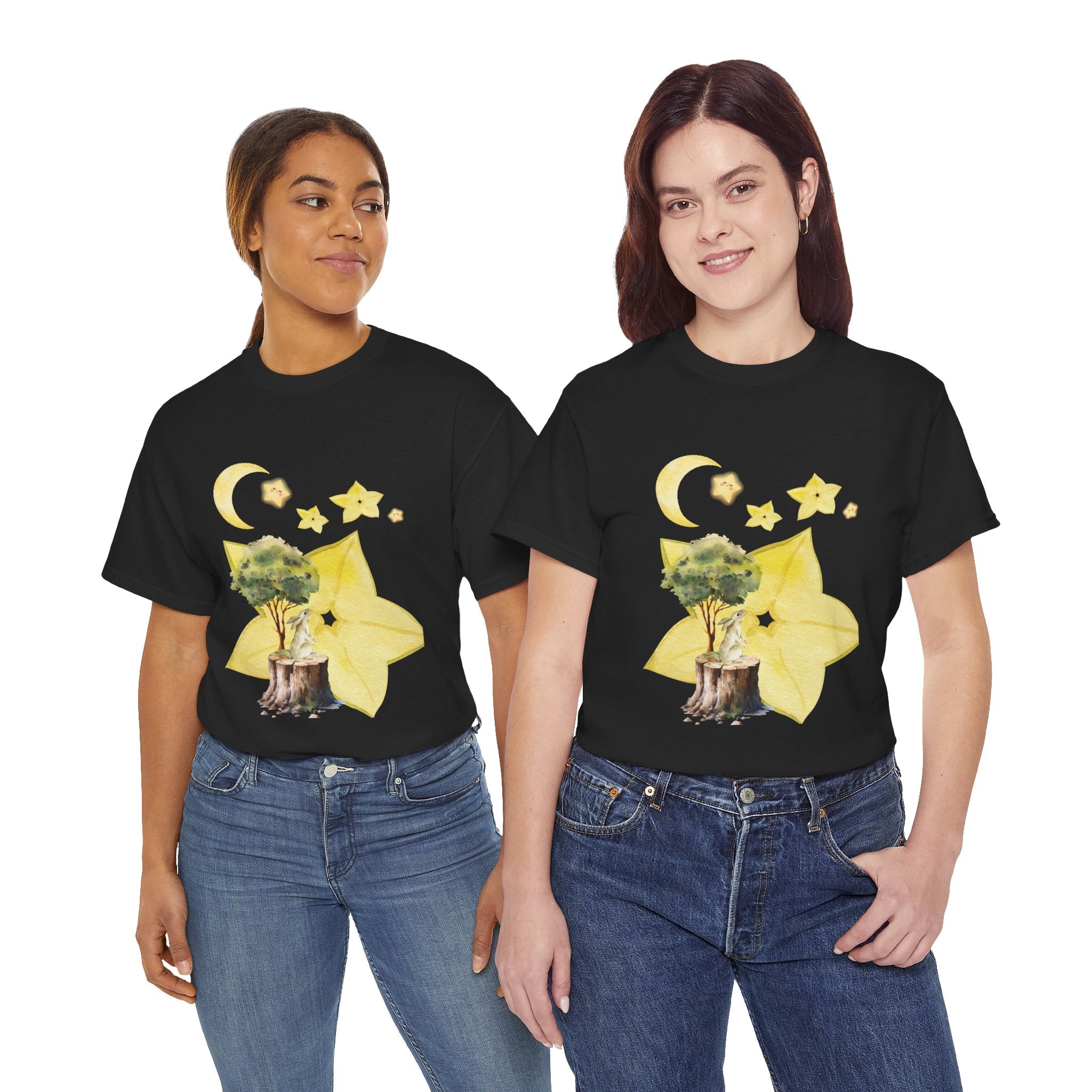 Two girls wearing black t-shirts featuring a graphic design of a tree stump, leaves, and starfruit celestial elements.
