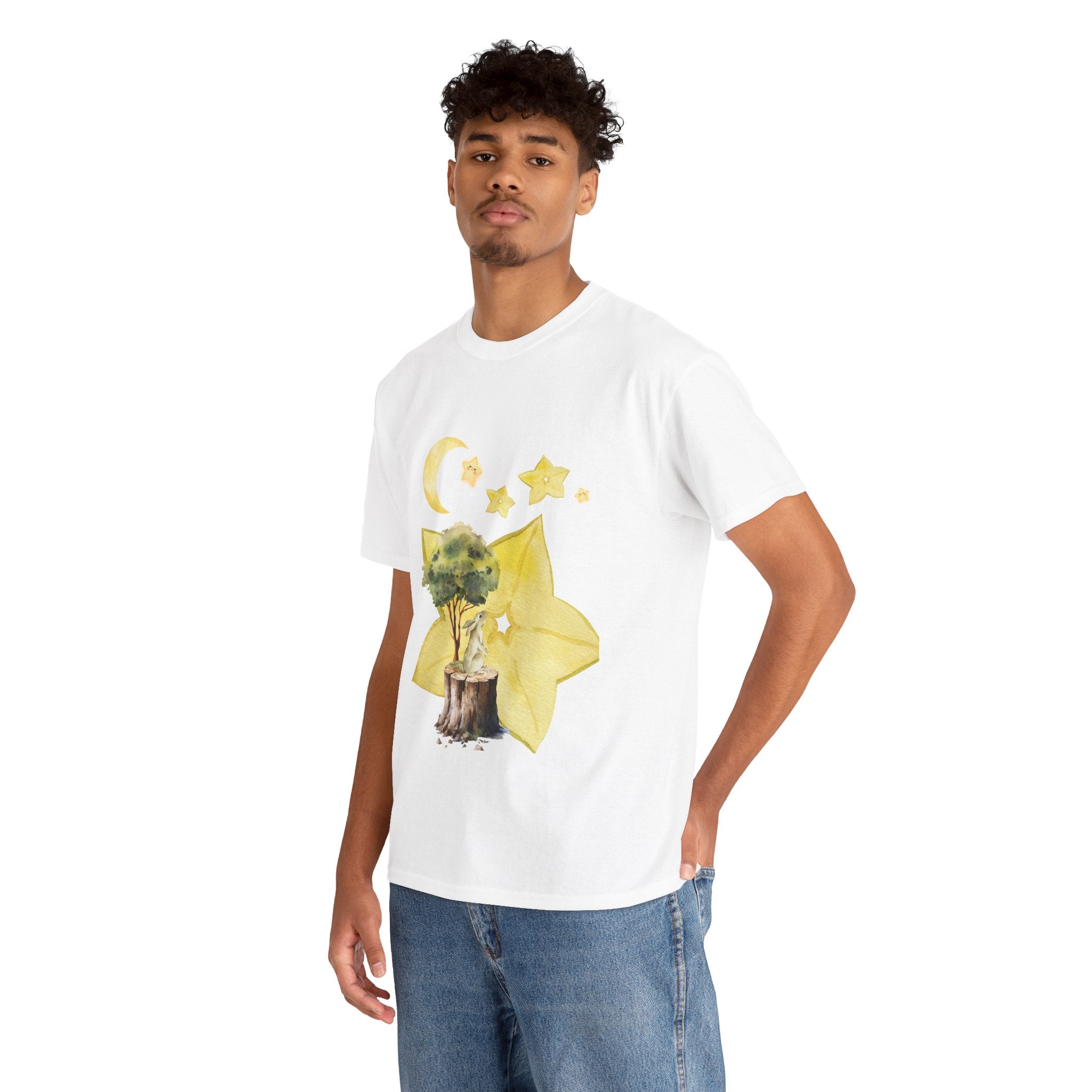 A man wearing a white t-shirt featuring a graphic design of a tree stump, leaves, and starfruit celestial elements.
