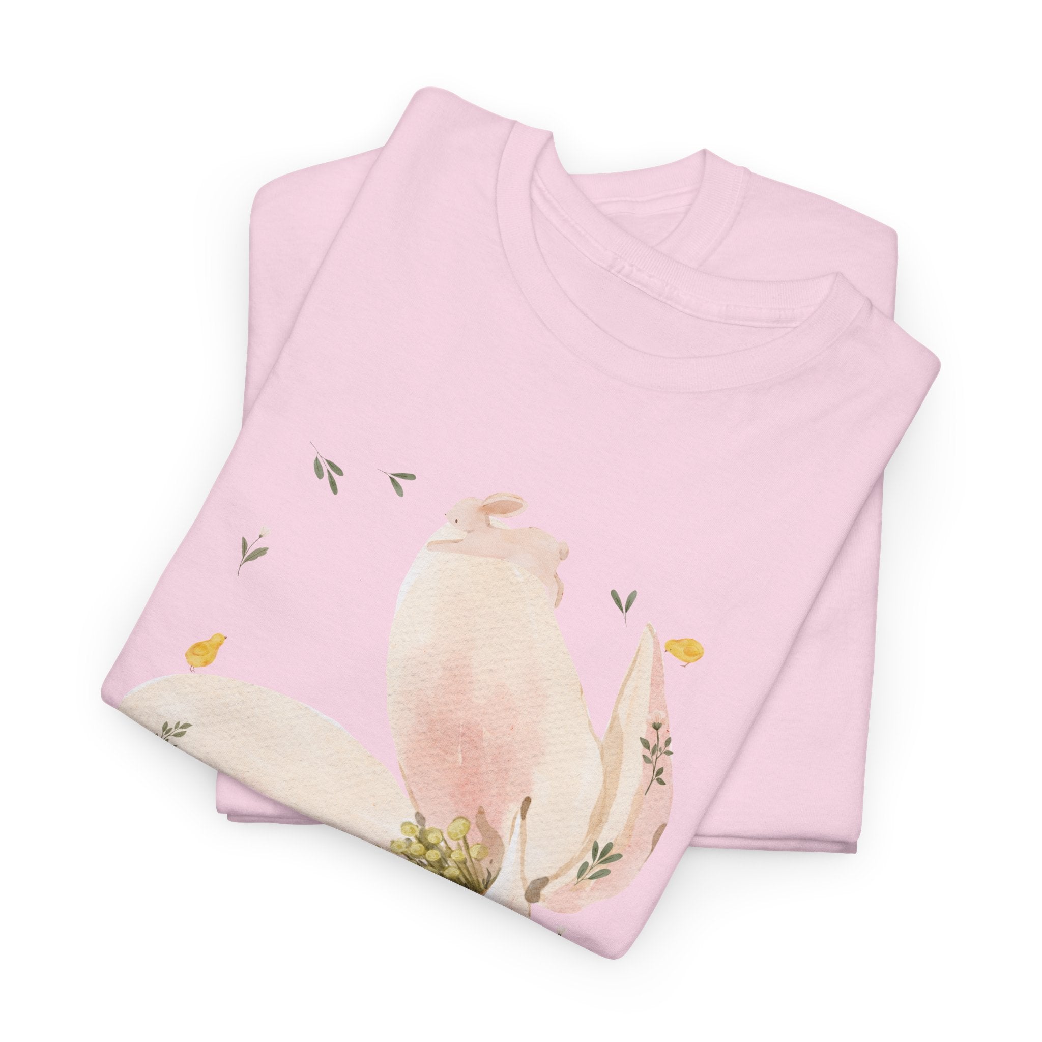 A folded pink t-shirt featuring a graphic design of a pink bloom surrounded by bunnies in various poses.