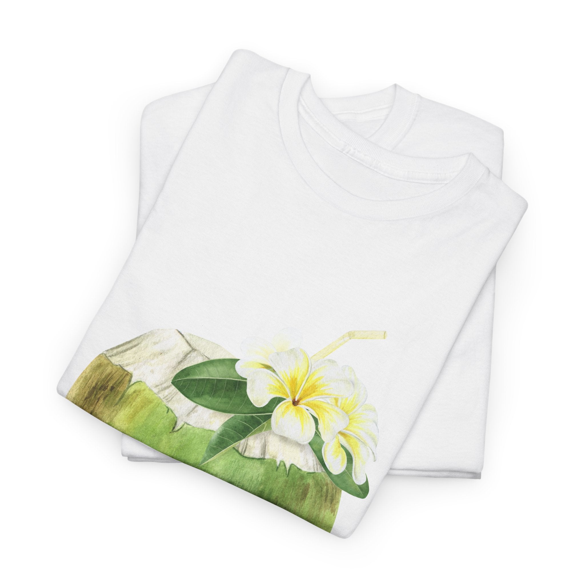 A folded white t-shirt featuring a graphic design of a hermit crab in a coconut shell and a straw-topped coconut.