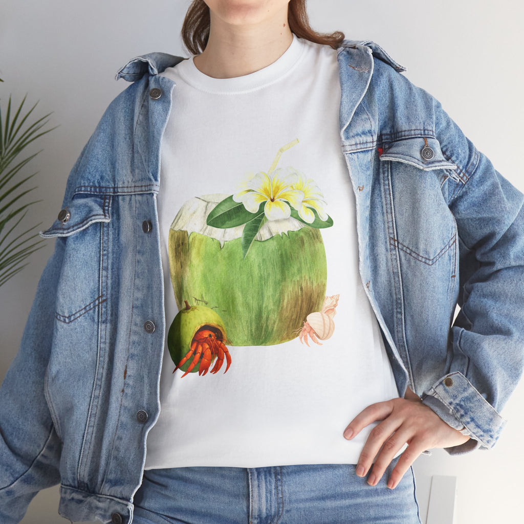 A girl wearing a denim jacket over a white t-shirt featuring a colorful design of a hermit crab in a coconut shell and a straw-topped coconut.