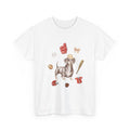 White t-shirt with a dog in a baseball hat surrounded by a circle of balls, bats, and helmets.