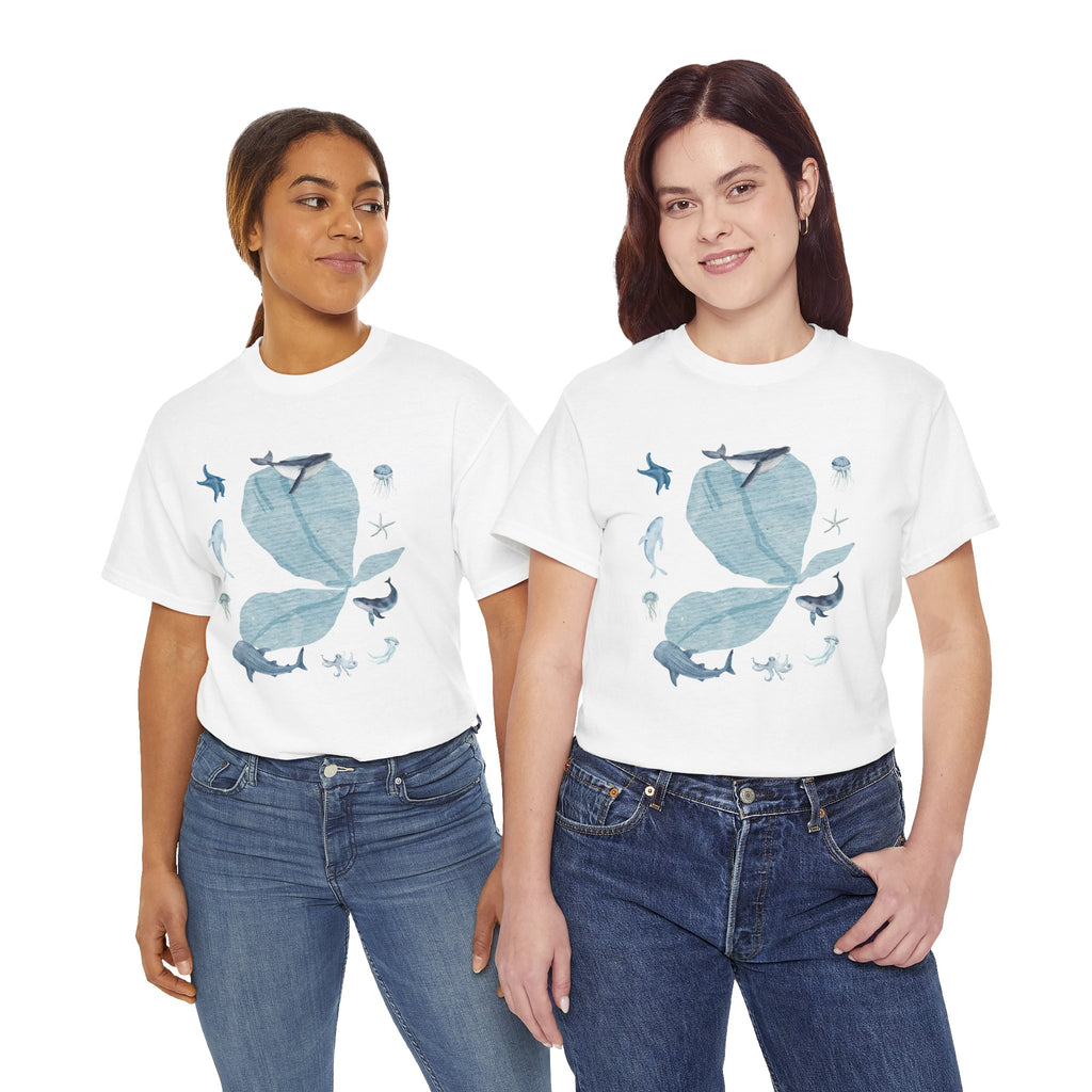 Two girls wearing white t-shirts featuring a graphic design of a blue bloom surrounded by whales, jellyfish, and starfish.