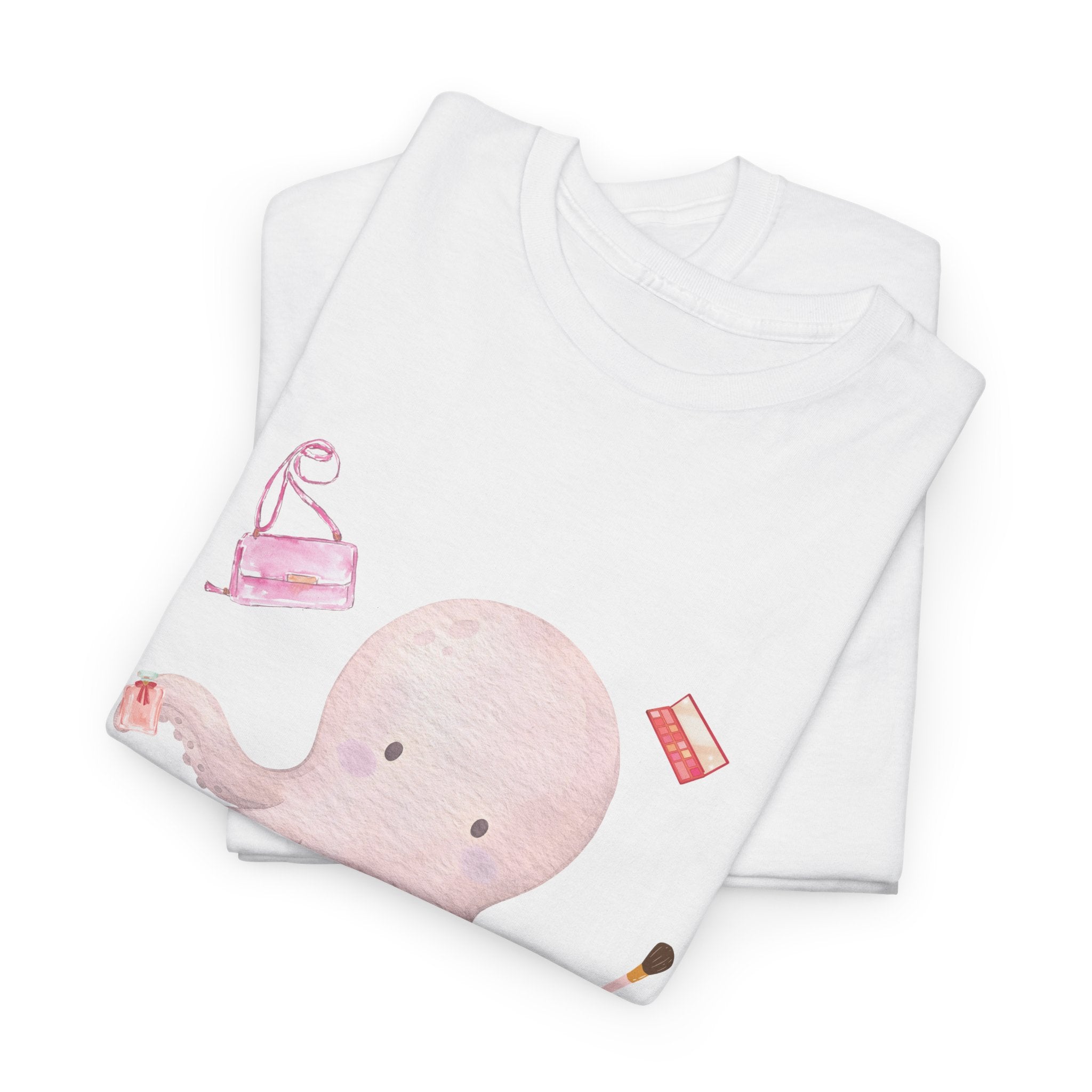 A folded white t-shirt featuring a graphic design of a pink octopus multitasking its tentacles to apply lipstick, brush on makeup, and juggle beauty accessories.